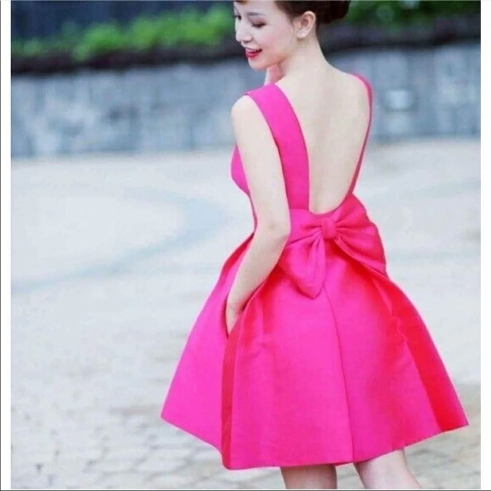 Kate Spade silk mini dress in white with open back and a bow
